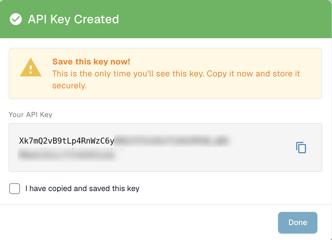 API Key Created 对话框，仅显示一次完整密钥